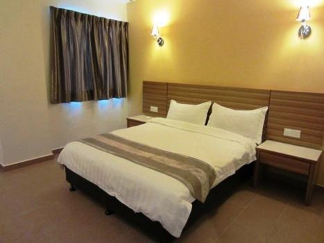 Grand Court Hotel Teluk Intan Habitación foto